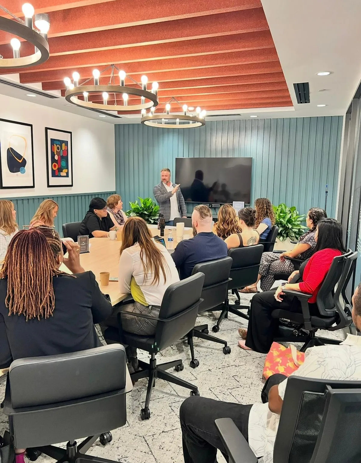 Business owners in an IronRanger Media social media strategy session